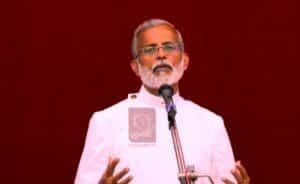 Rev. C.V. Simon delivering Malayalam Christian Messages on the life of Elijah and the importance of prophetic leadership.